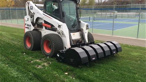 aerator attachment for skid steer|bobcat skid steer attachments.